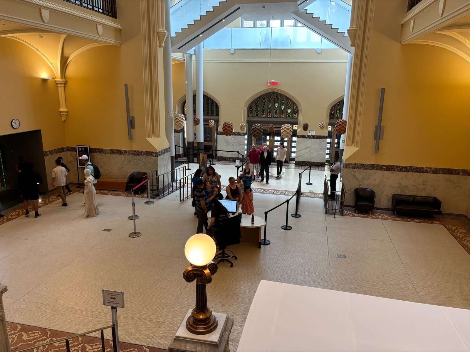 Grand lobby of the Canadian Museum of Nature with visitors at the entrance