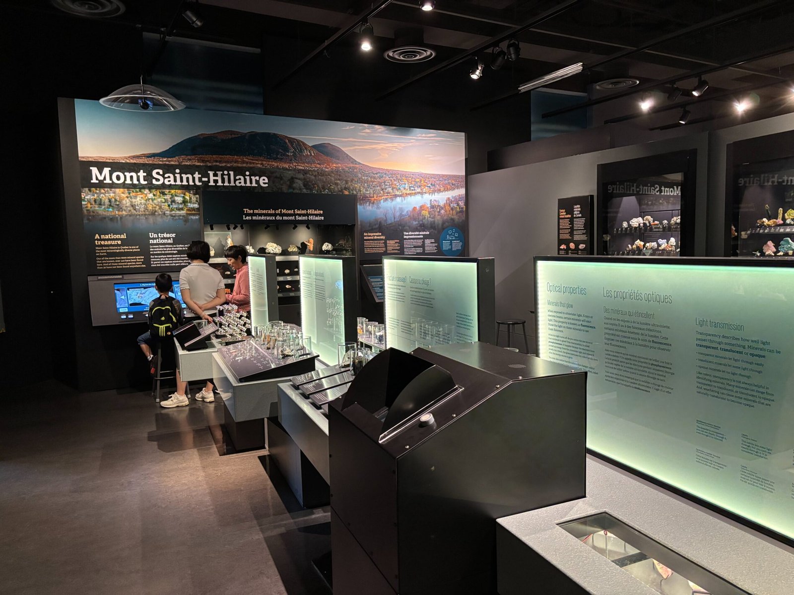 Display of rare minerals from Mont Saint-Hilaire with interactive panels