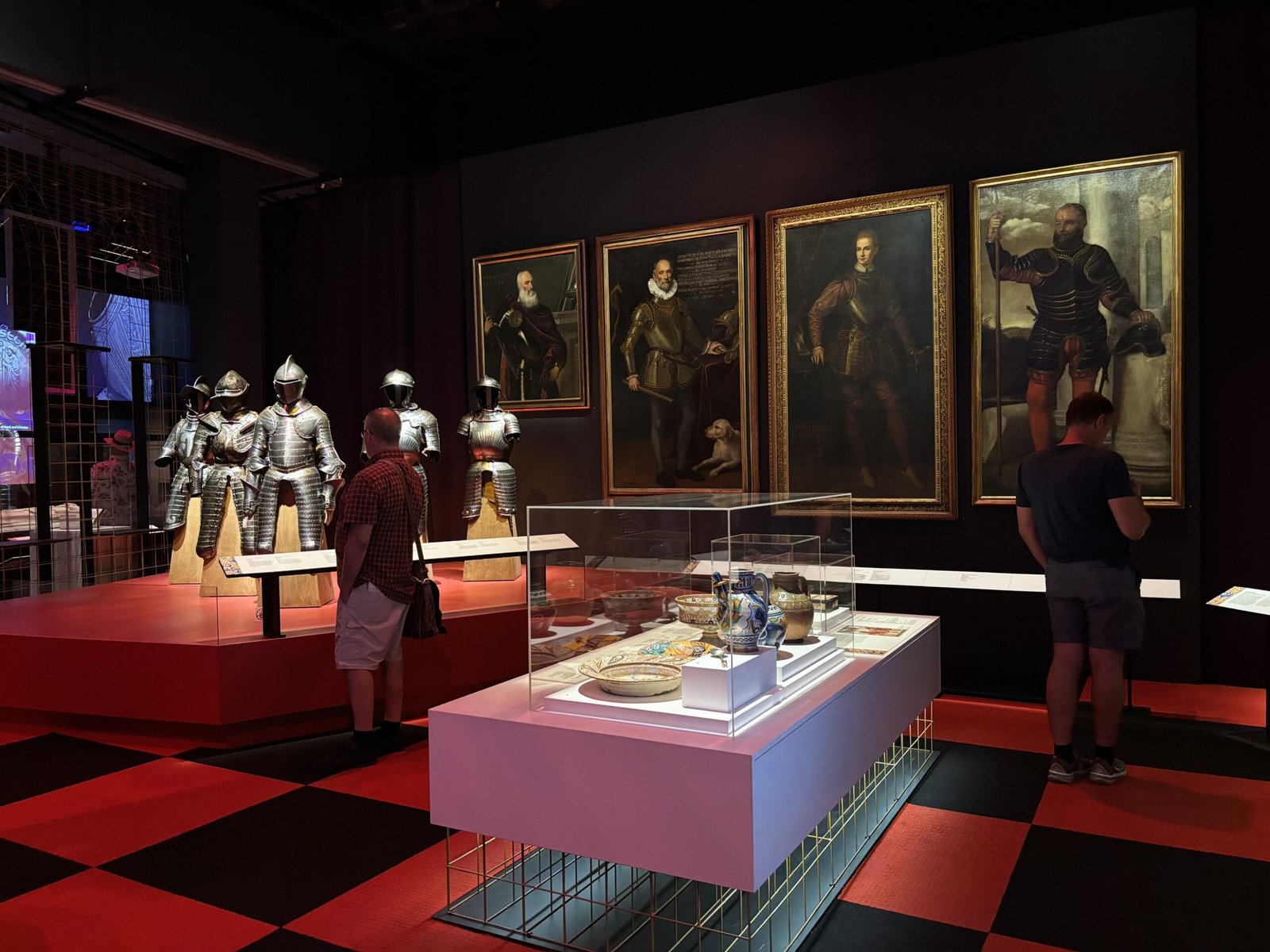 Room with suits of armor and Renaissance-era portraits inside the museum’s European exhibit.