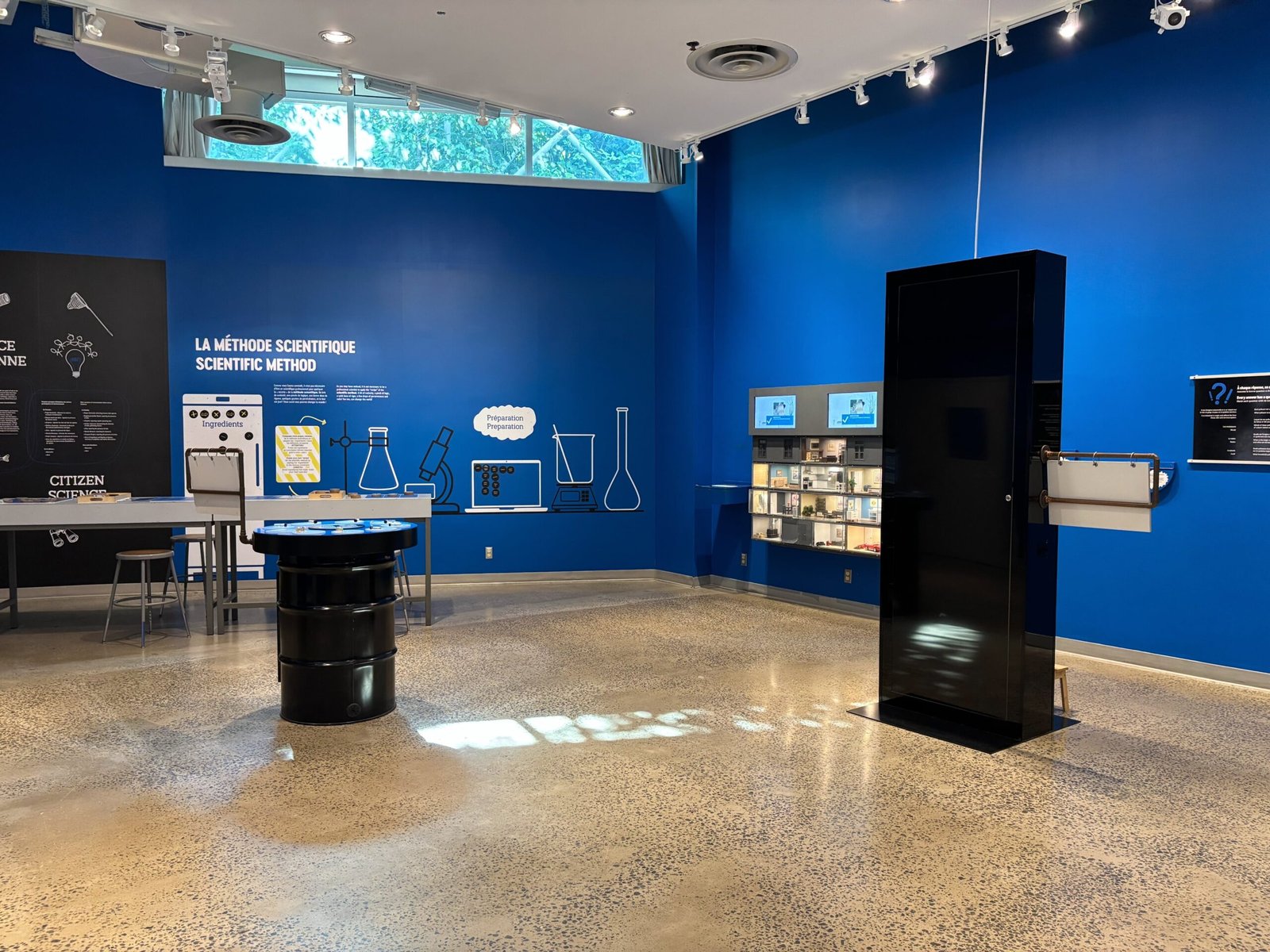 Bright blue room explaining the scientific method at the Biosphere in Montreal.