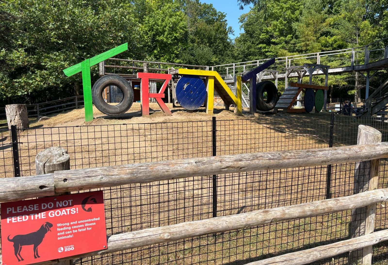 Colorful Toronto Zoo sign made of giant letters in the Kids Zoo area.