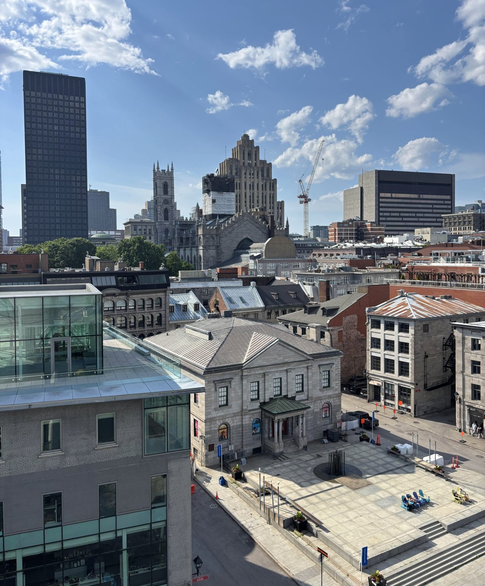 The Montreal Notre-Dame Basilica and surrounding heritage buildings near Pointe-à-Callière Museum.