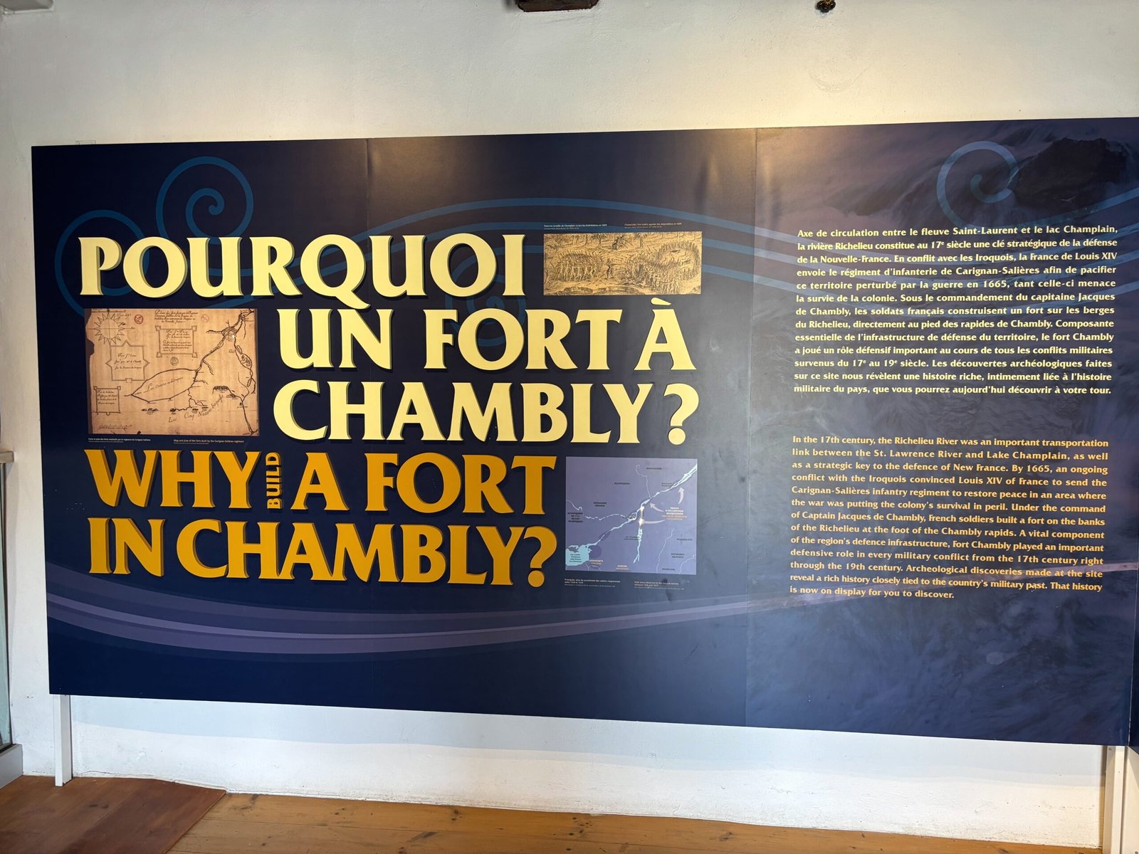 Bilingual wall display explaining why Fort de Chambly was built along the Richelieu River, Quebec.