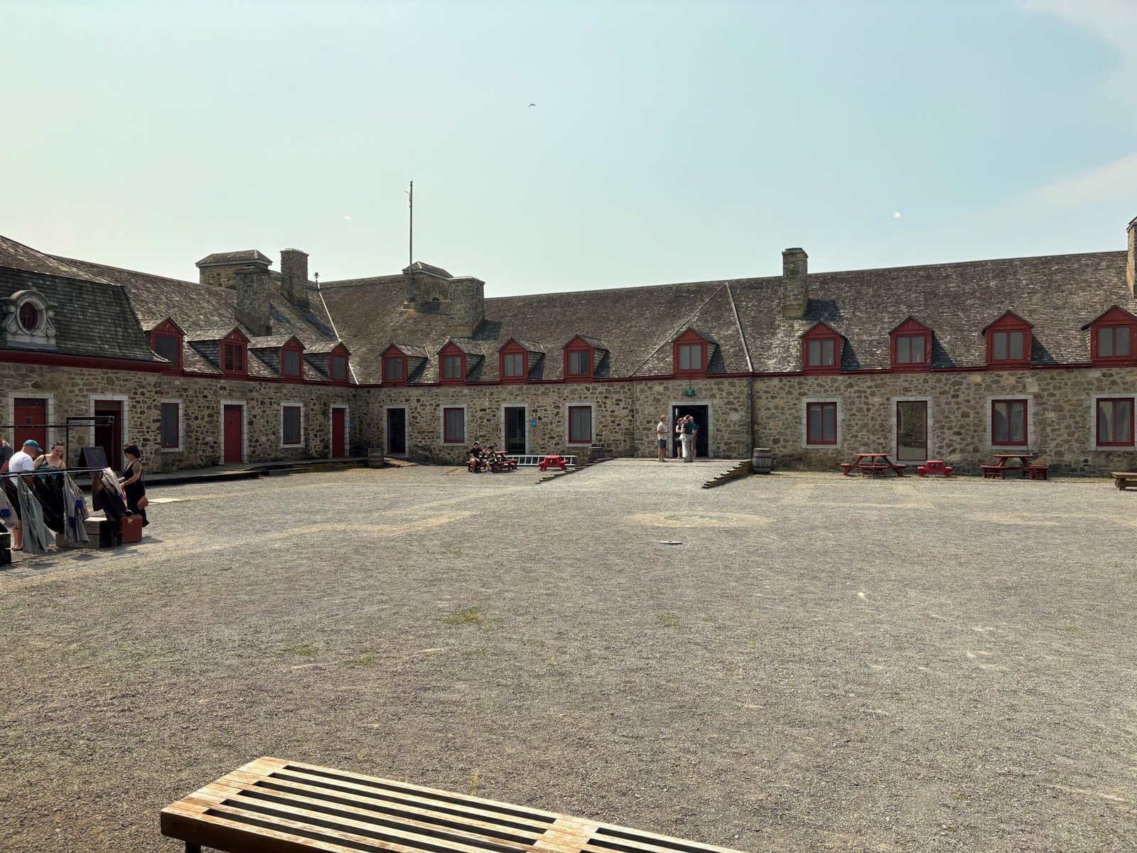 Visitors exploring the main courtyard of Fort de Chambly National Historic Site, Quebec.