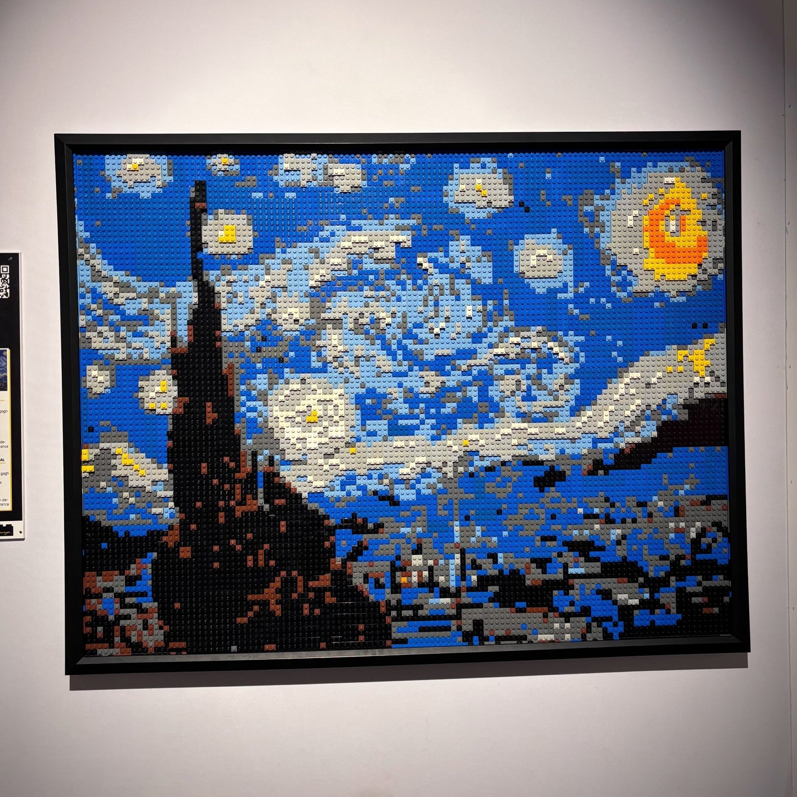 A vibrant LEGO mosaic of Van Gogh’s Starry Night featured at Montreal’s Art of the Brick Expo, blending classic art with brick craftsmanship.